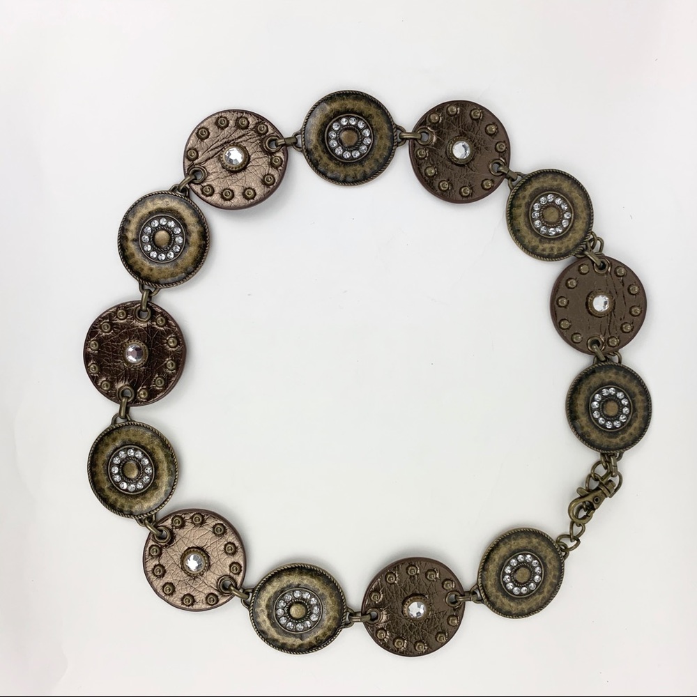 Concha belt of metal and leather decorated discs